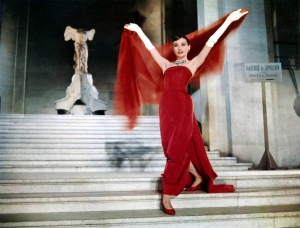 Audrey Hepburn walking down the stairs for a photo shoot in Funny Face
